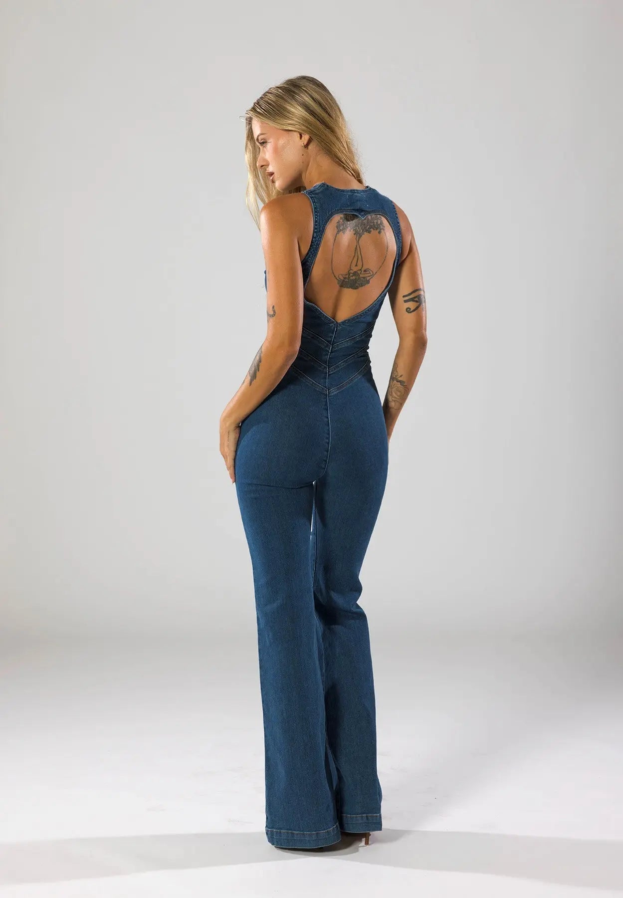 Vintage-Inspired Denim Jumpsuit with Deep V-Neck