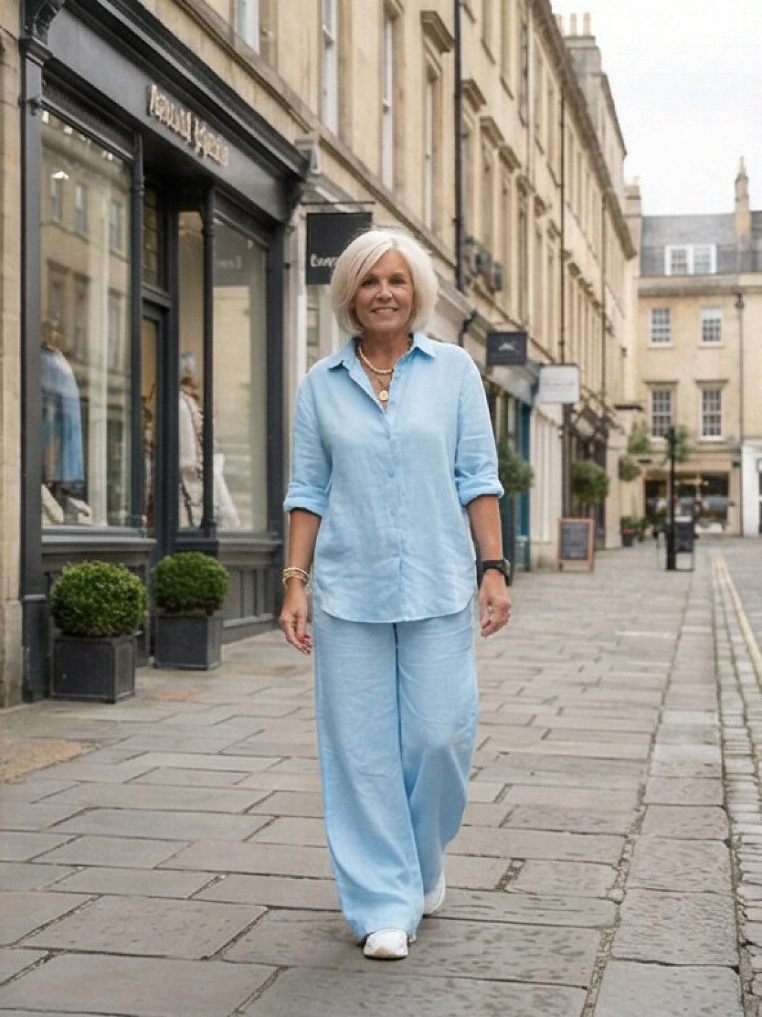 Women's casual linen set with button-down collared shirt and wide-leg pants