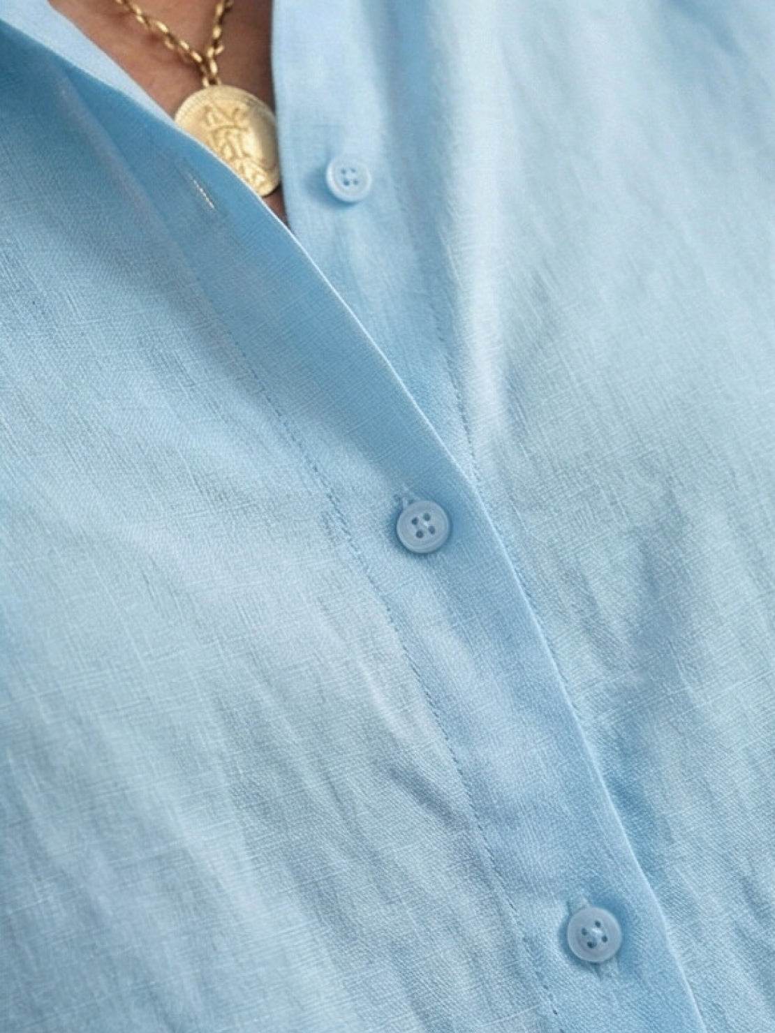 Women's casual linen set with button-down collared shirt and wide-leg pants