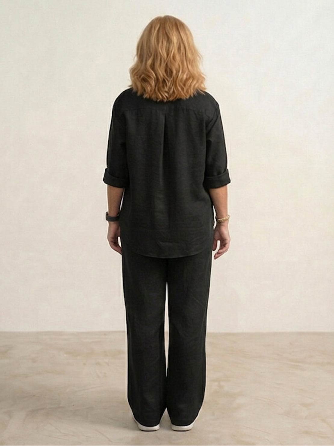 Women's casual linen set with button-down collared shirt and wide-leg pants