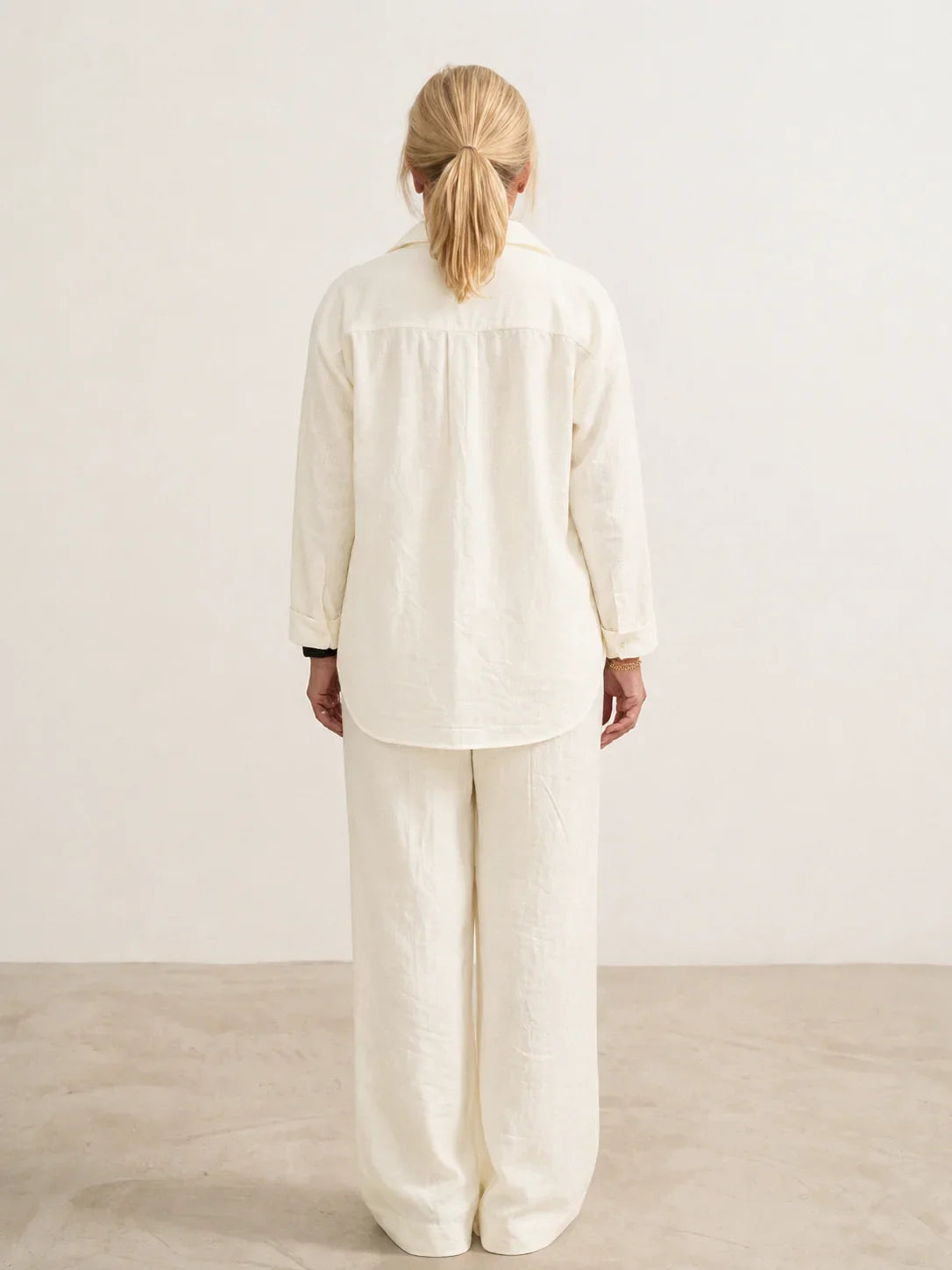 Women's casual linen set with button-down collared shirt and wide-leg pants