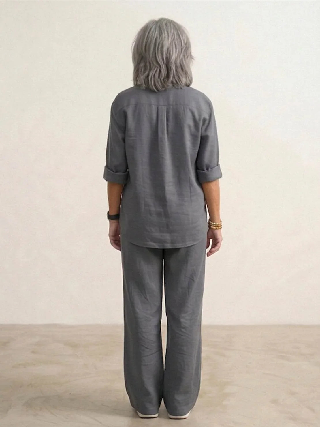 Women's casual linen set with button-down collared shirt and wide-leg pants