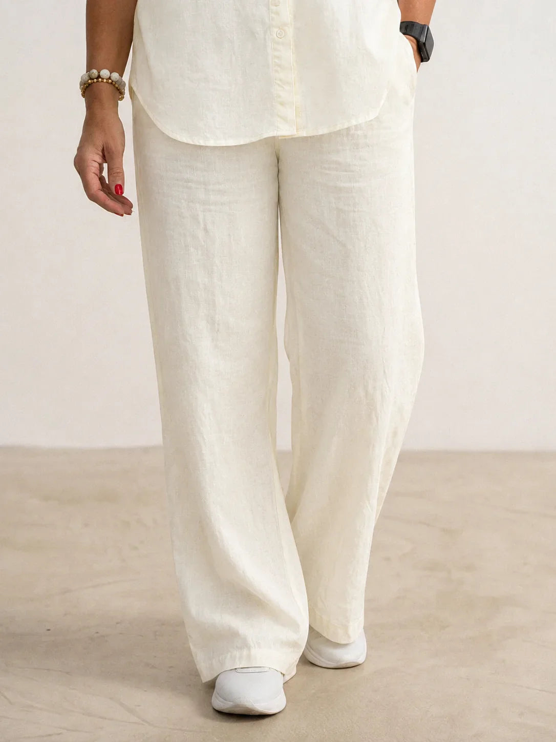 Women's casual linen set with button-down collared shirt and wide-leg pants