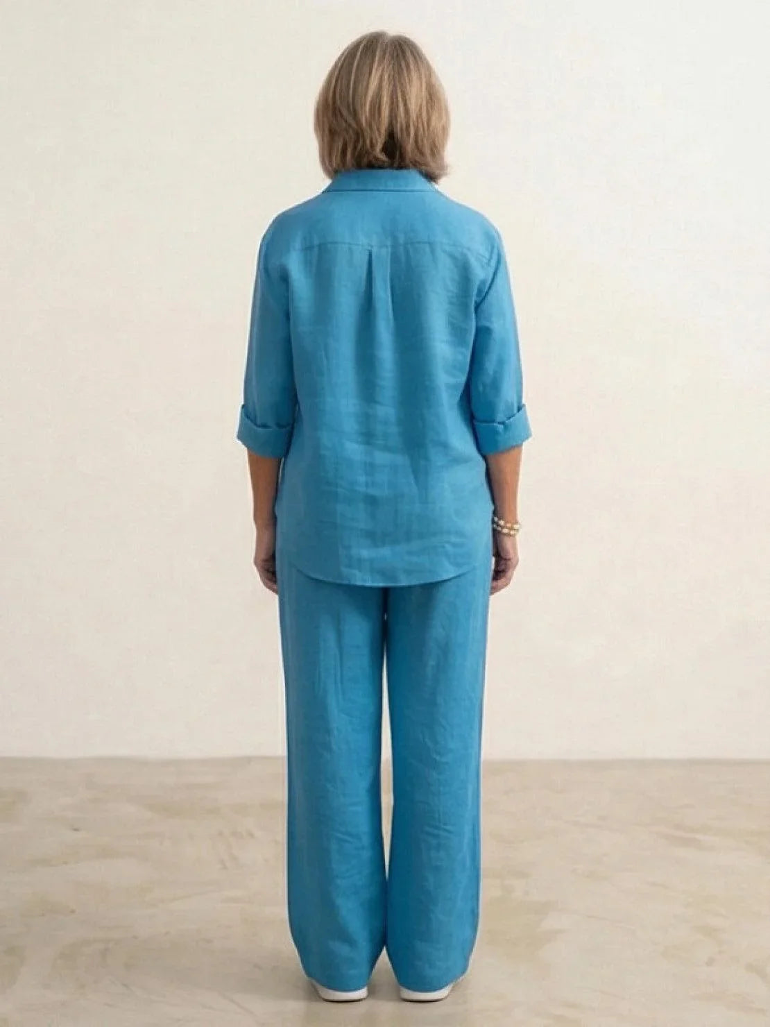 Women's casual linen set with button-down collared shirt and wide-leg pants