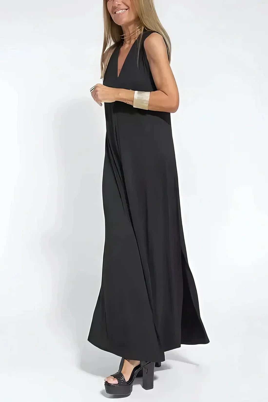 Women's knit flowy maxi dress with sleeveless V-neck and draped front