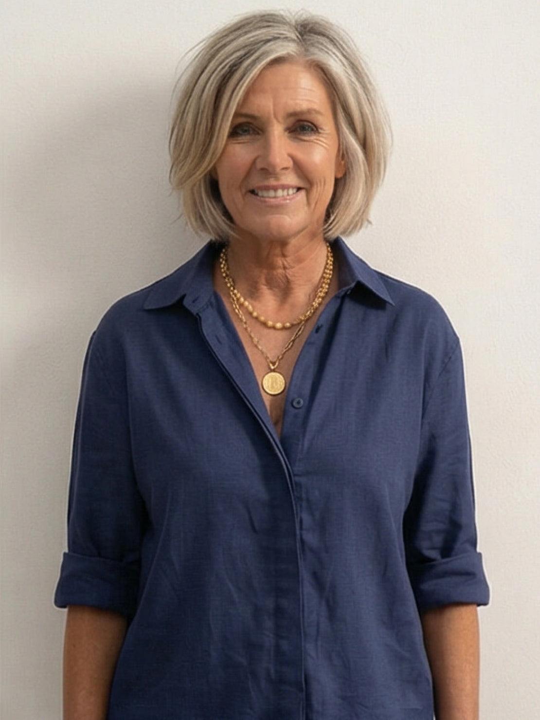 Women's casual linen set with button-down collared shirt and wide-leg pants