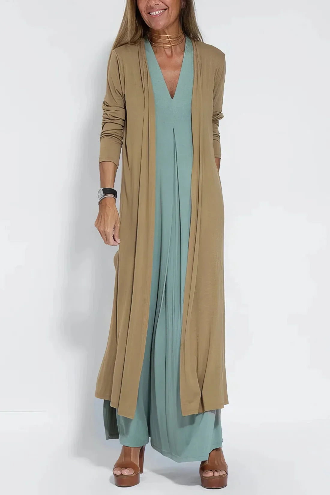 Women's knit flowy maxi dress with sleeveless V-neck and draped front